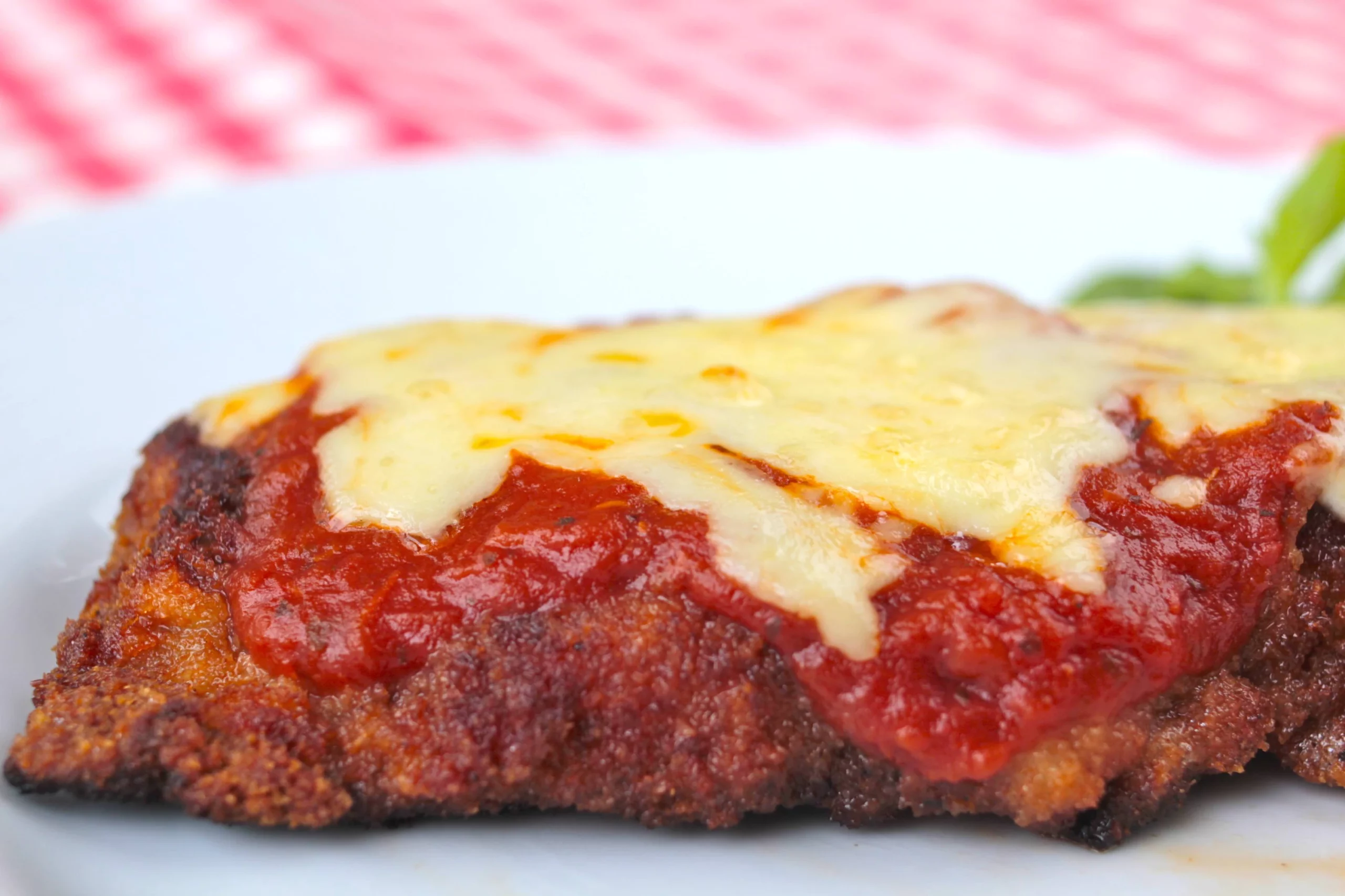 Bife à Parmegiana e Abobrinha Refogada